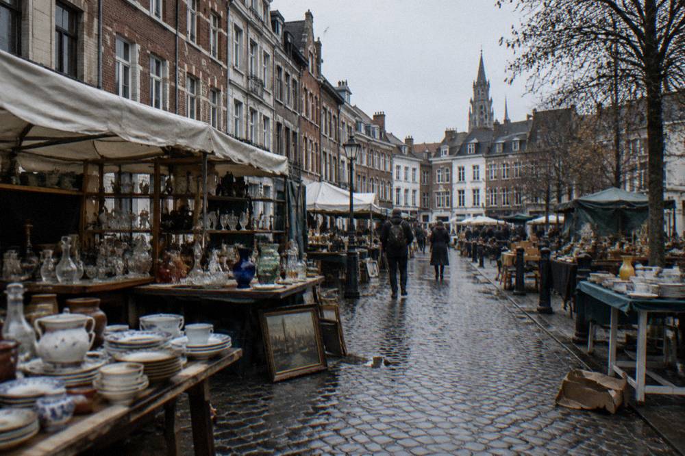 Market stalls and old facades in the Marolles district of Brussels
