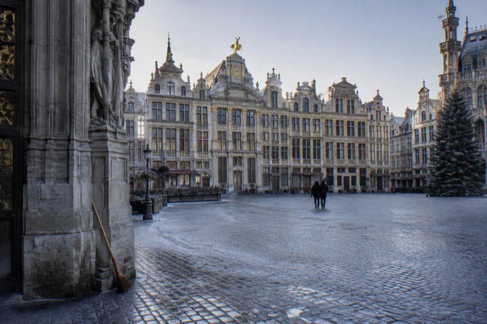 The ornate guildhall facades of the Grand-Place in Brussels seen from the square