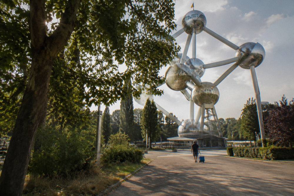 The Atomium spheres seen from the open plaza with walkways and trees below