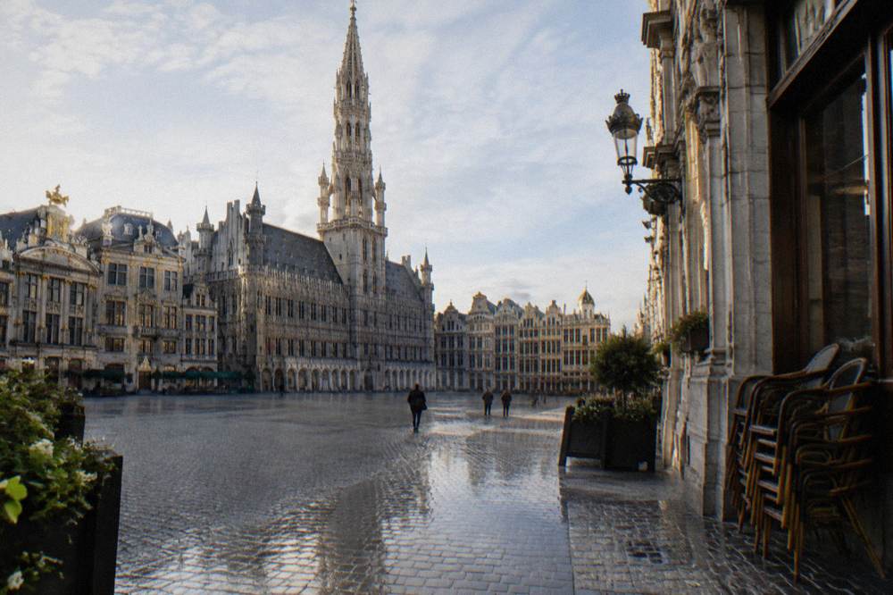 The Grand-Place in Brussels with the City Hall tower rising above the rooftops of the square