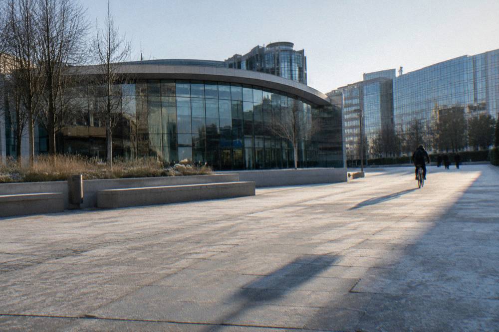 The exterior of a modern museum building in the European Quarter of Brussels on a clear day