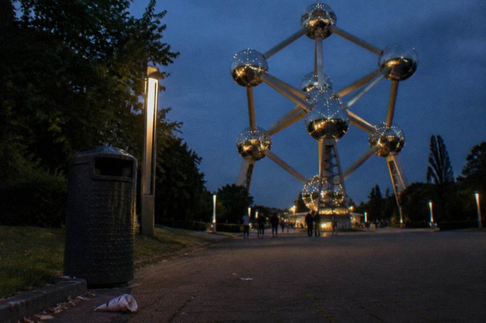The Atomium spheres and columns photographed from the open plaza at dusk