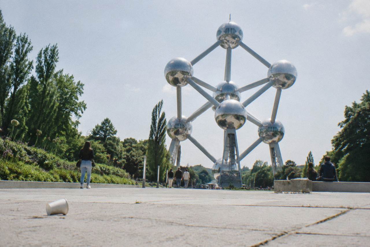 The Atomium structure rising above a open plaza under a wide sky
