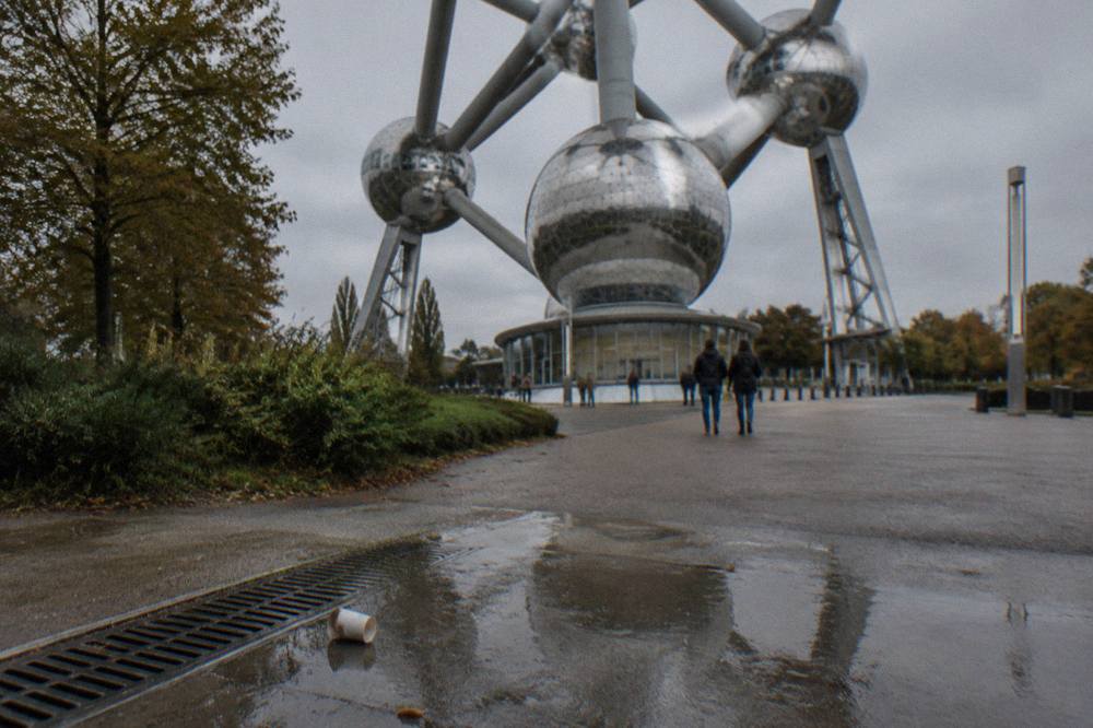 The Atomium spheres seen from the open plaza with the surrounding Heysel ground visible