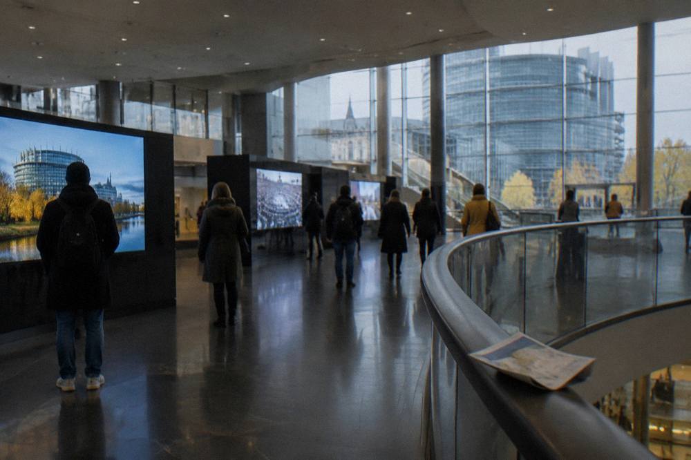 Interactive exhibition hall inside the Parlamentarium with media installations and walkways
