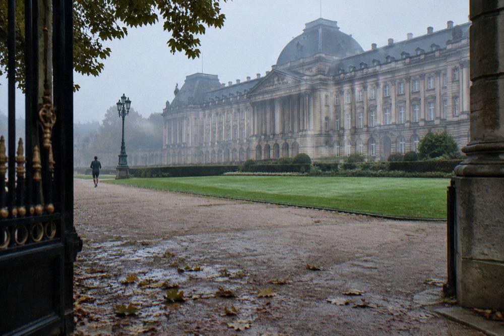 Wide view of the Royal Palace of Brussels facade and the gravel square in front