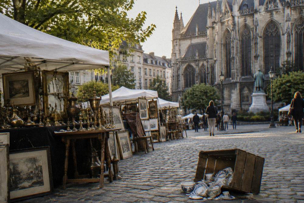 Market stalls with antiques and bric-a-brac set out on a Brussels square
